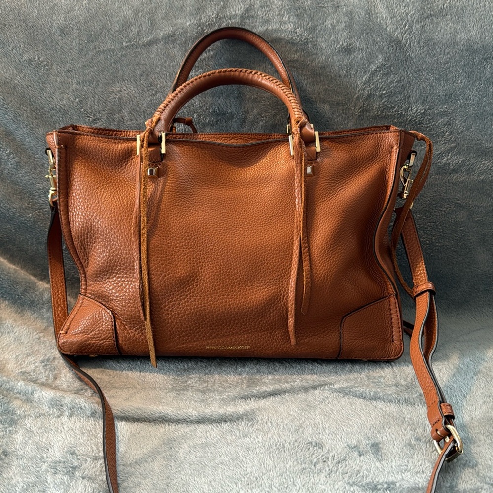 Tanned Rebecca Minkoff purse. In great condition.